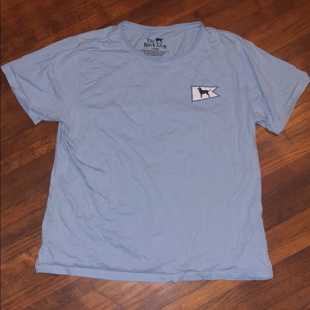 A light blue “The Black Dog” T-shirt